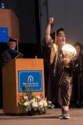 2016 Graduate with weight belt